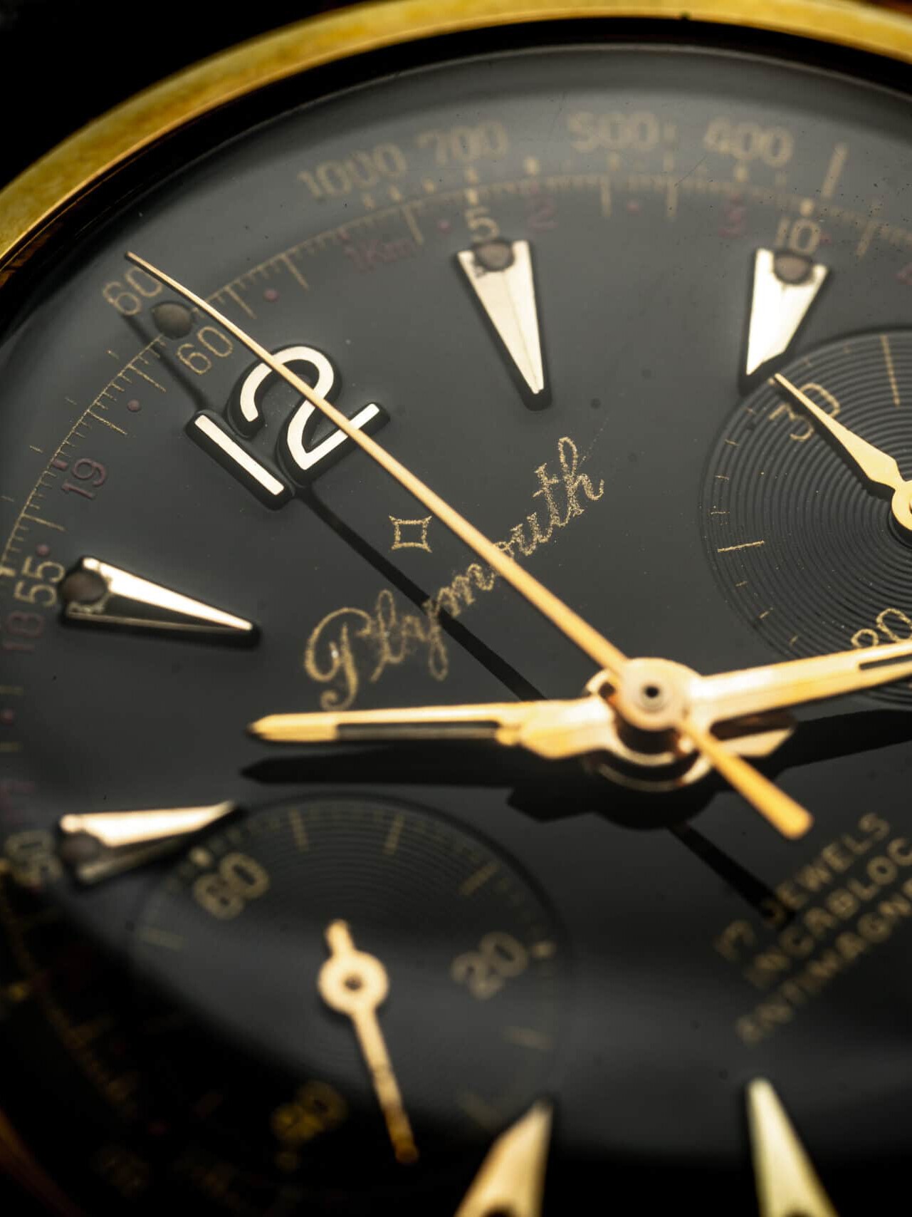 Plymouth chronograaf zwarte wijzerplaat gold cap